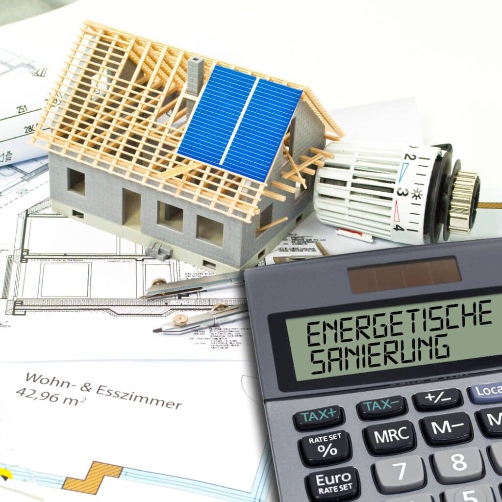 Construction or building plan with bricks and calculator showing the german word for energetic renovation - energetische sanierung